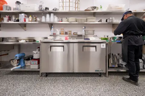 prep bench with a planetary mixer and refrigerated drawers