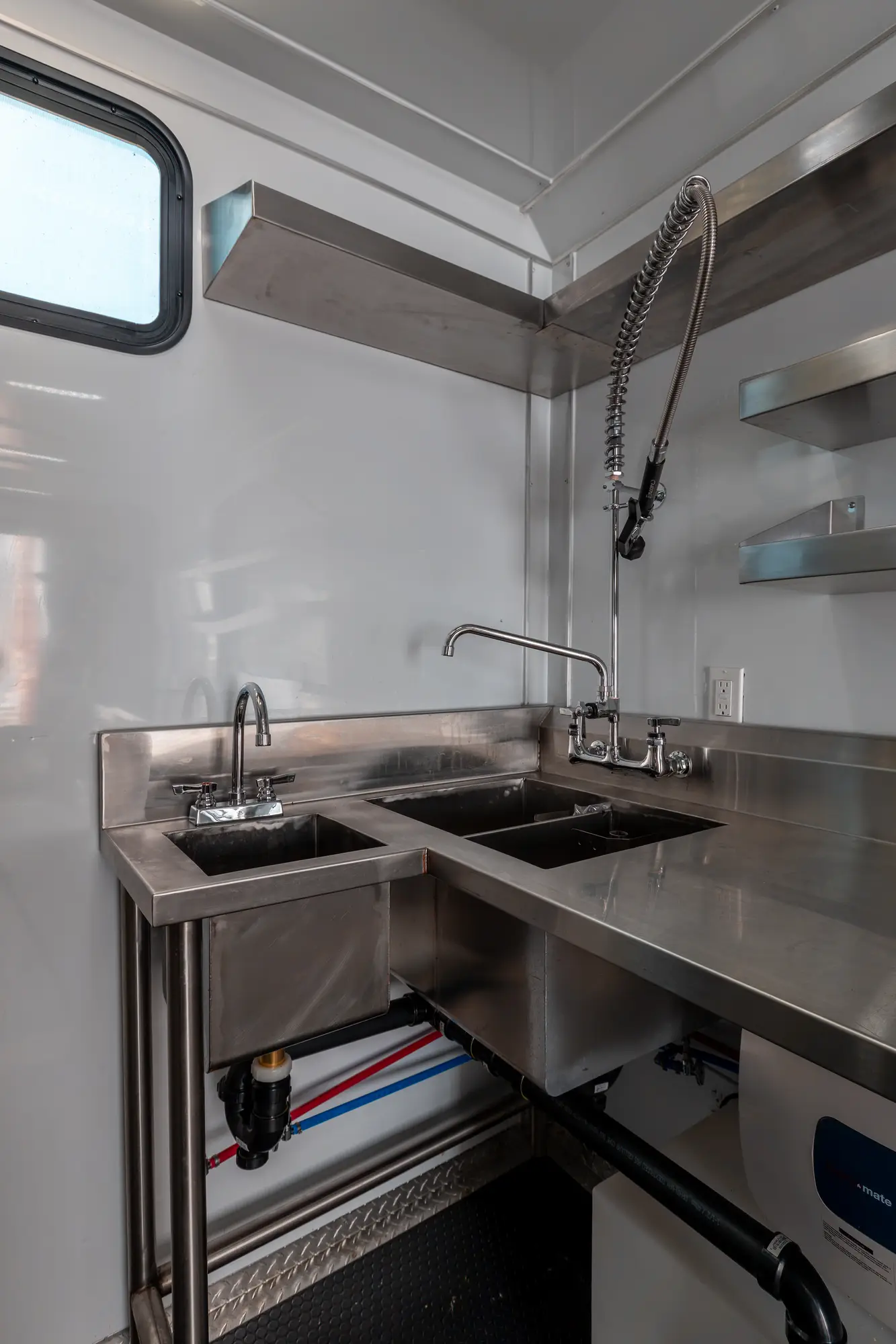 stainless sink run inside the mobile kitchen