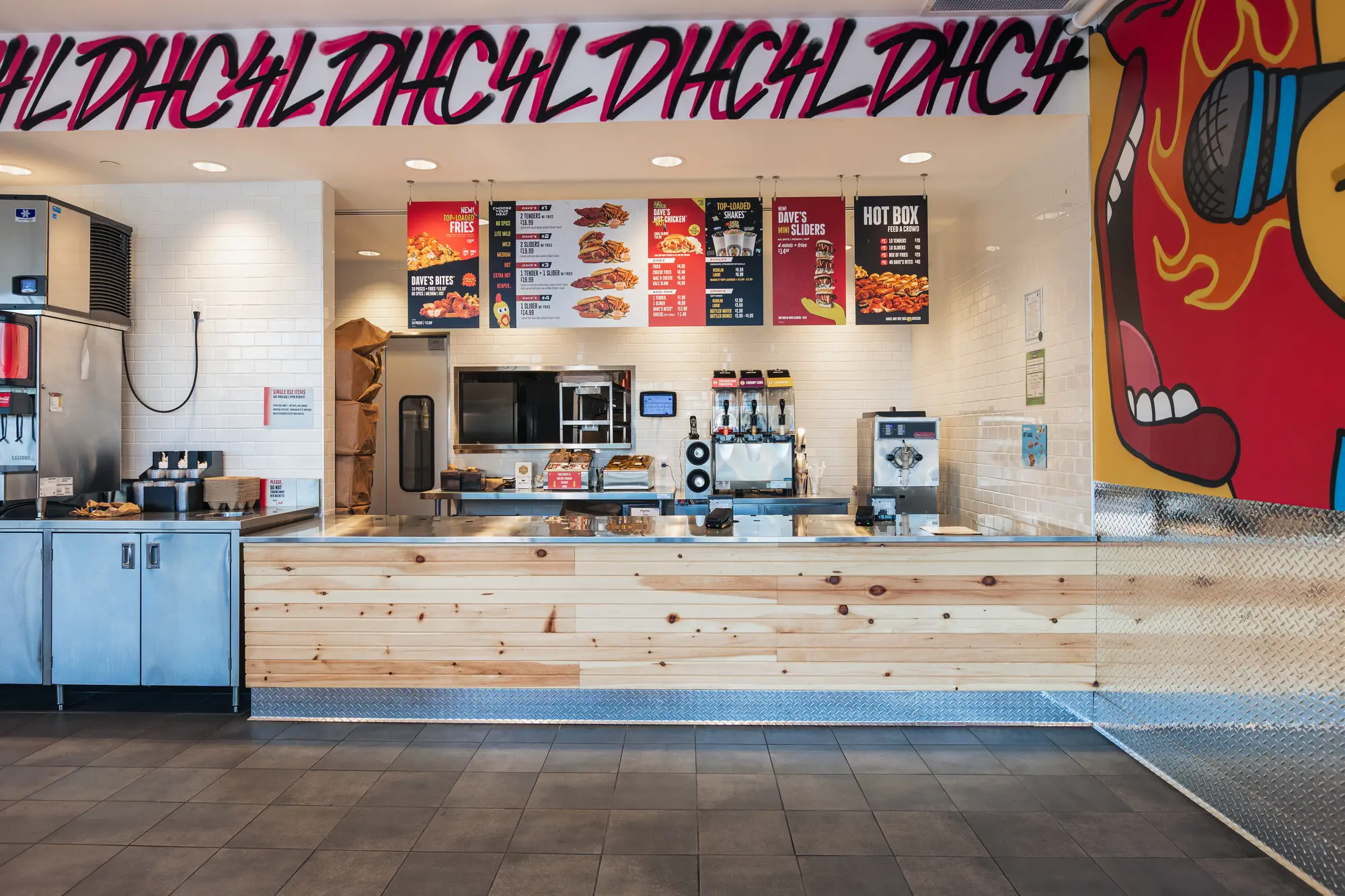 Front service counter and menu boards at Dave's Hot Chicken Pickering