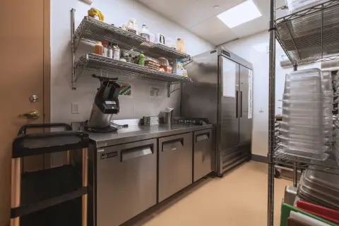Worktable, wire shelving and reach-in refrigeration