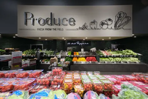 produce department under a Produce Fresh From the Field sign