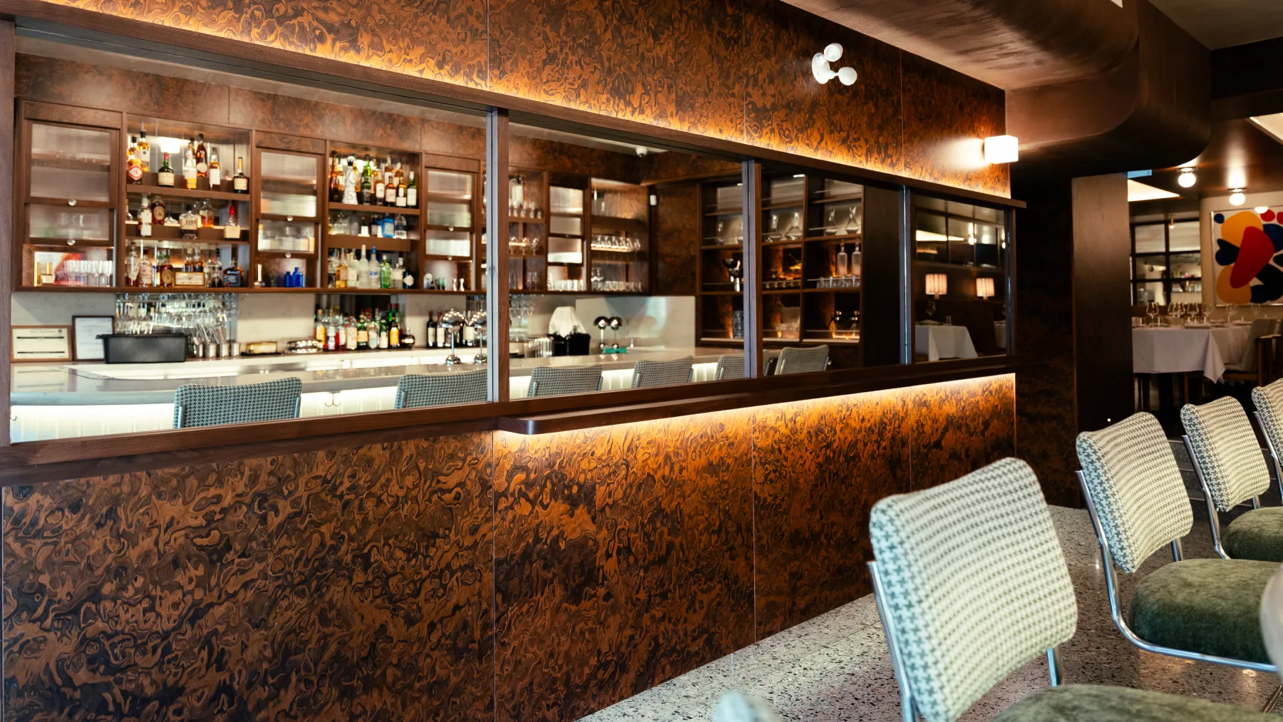 Linny's bar with illuminated counter and bottle display