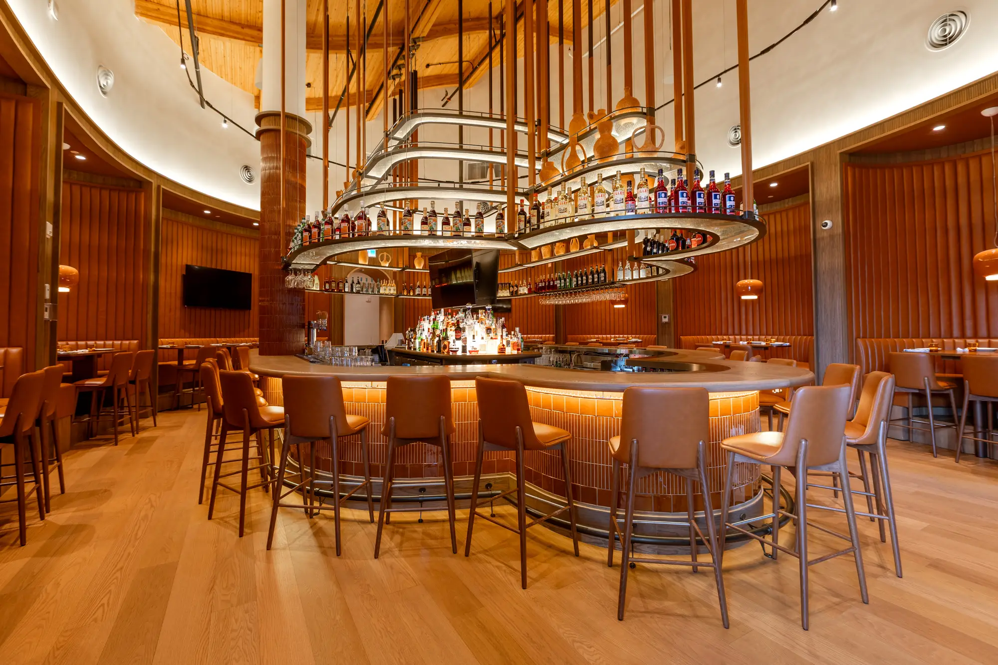 Circular bar and back bar millwork at Mercatto Centrale