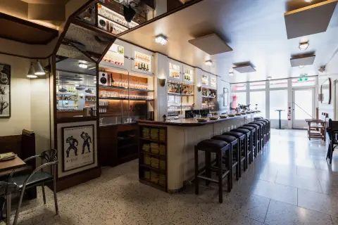 N.L. Ginzburg dining room and bar looking toward the windows