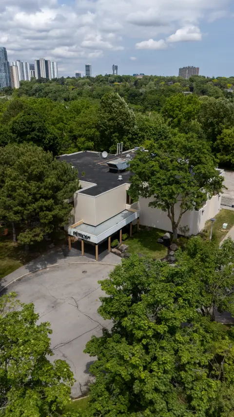 Aerial view of the Petros82 building among the trees in York Mills