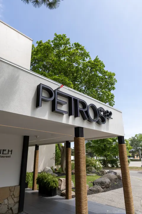 Petros82 sign over the entrance canopy