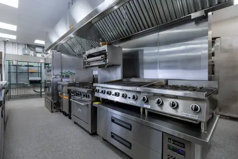 Petros82 cook line with range and griddle under the hood