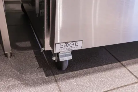 Edge Food Equipment badge on a stainless base
