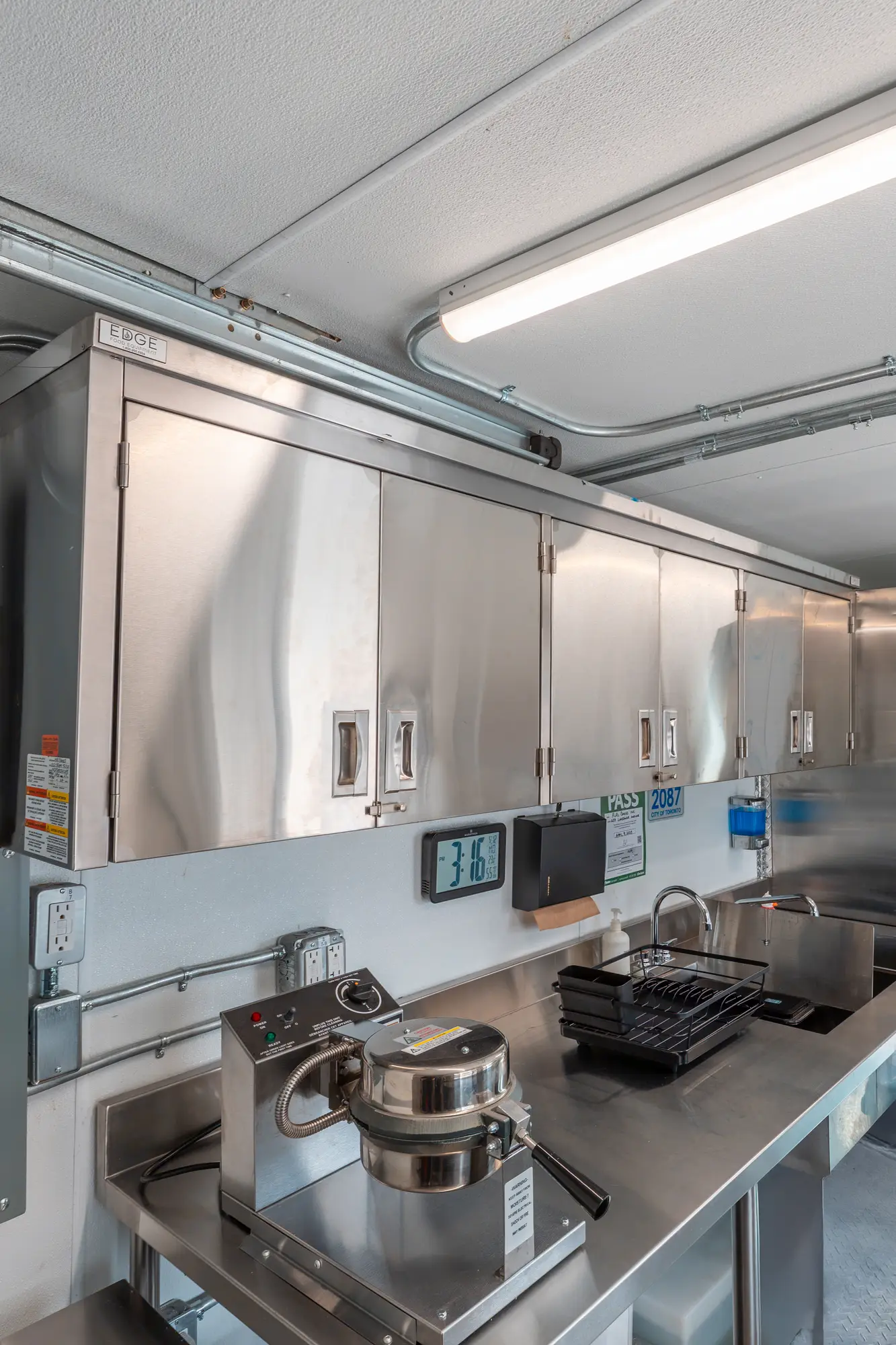 storage cabinets and refrigeration inside the truck