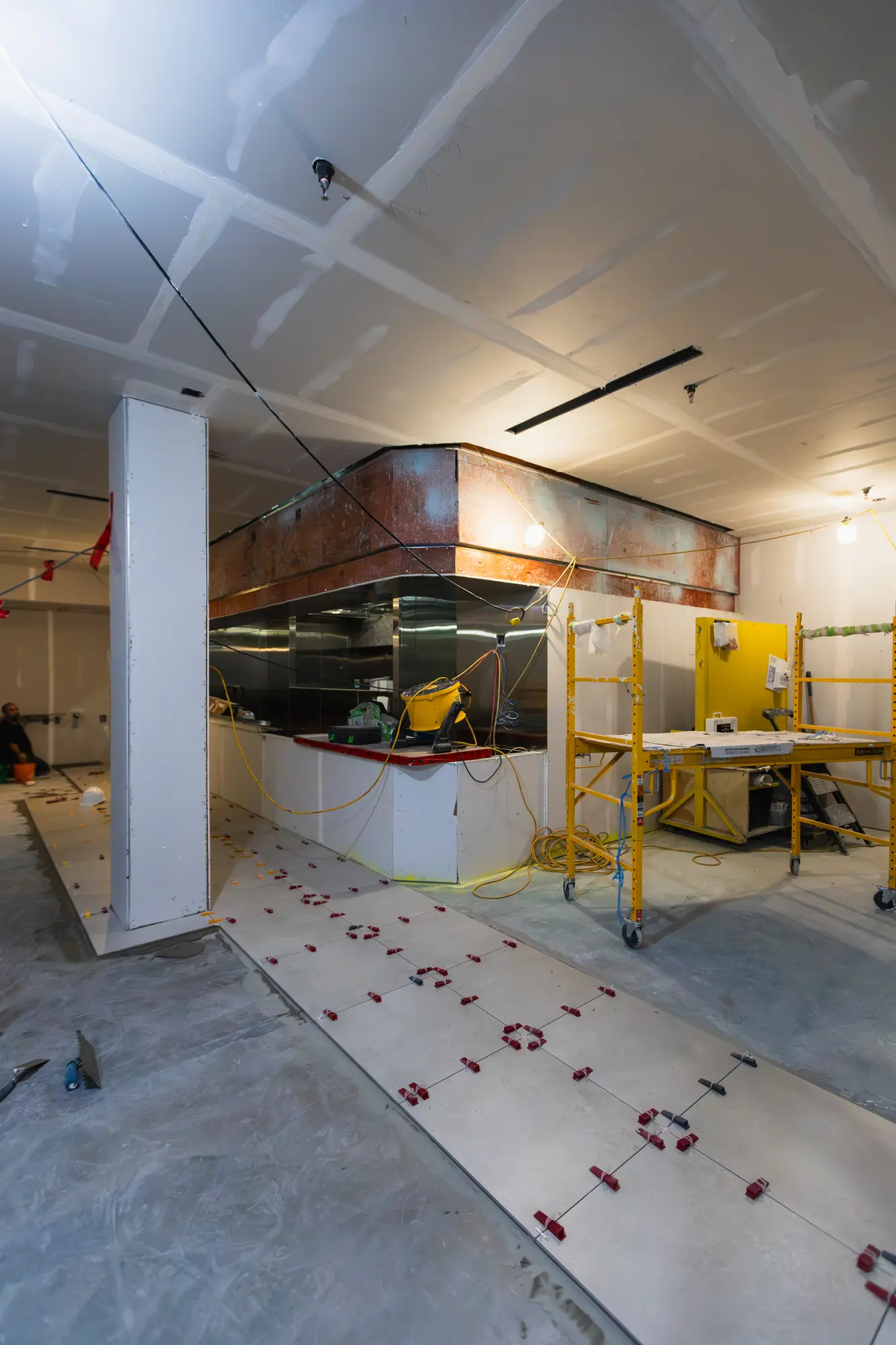 Bare shell with ventilation canopy before equipment installation at Shake Shack Square One