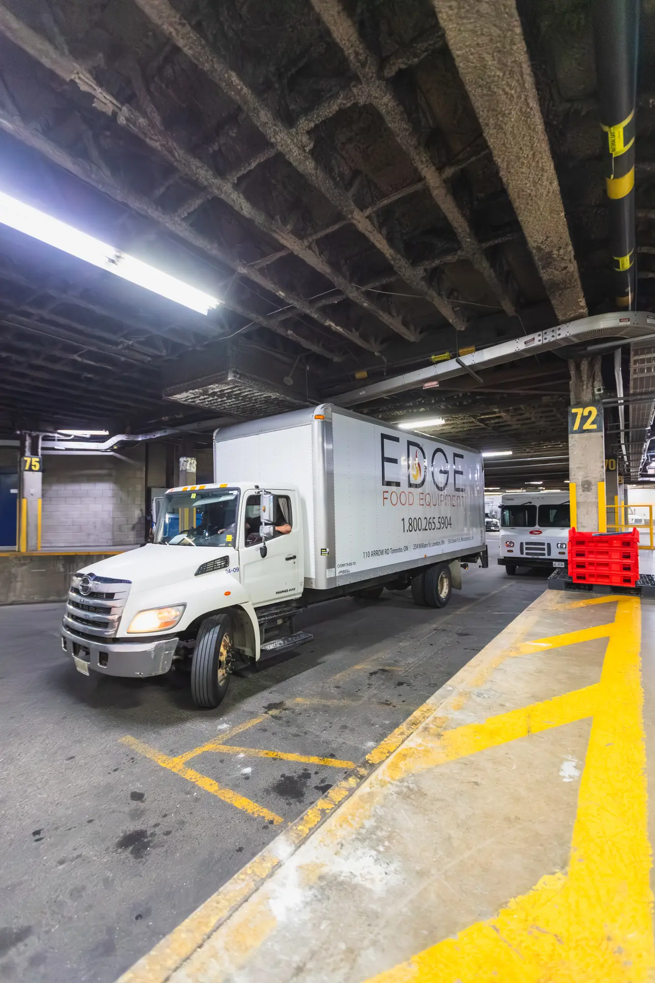 Edge Food Equipment delivery truck at the Square One loading dock