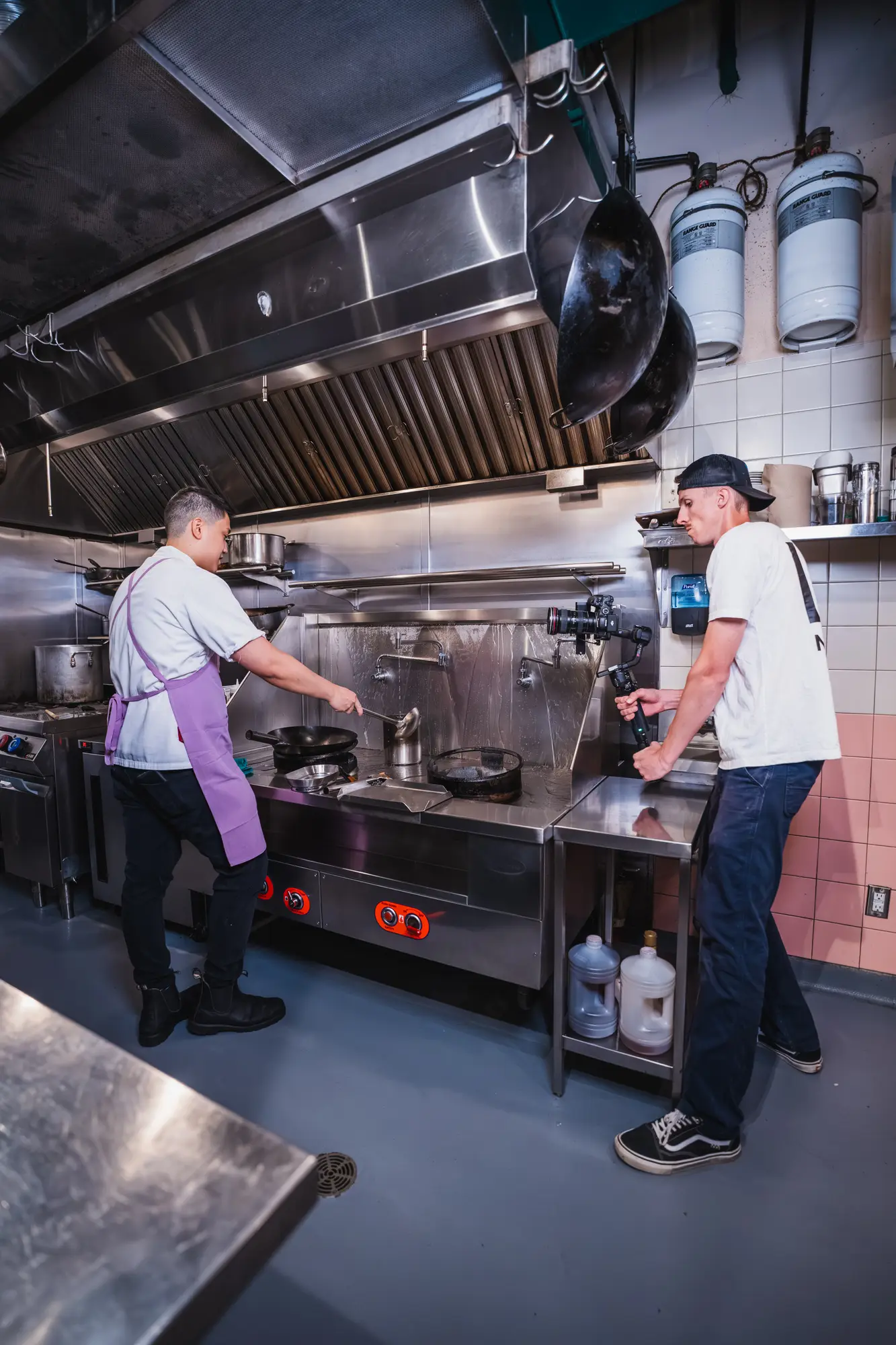 two chefs working the cook line at Sunny's Chinese
