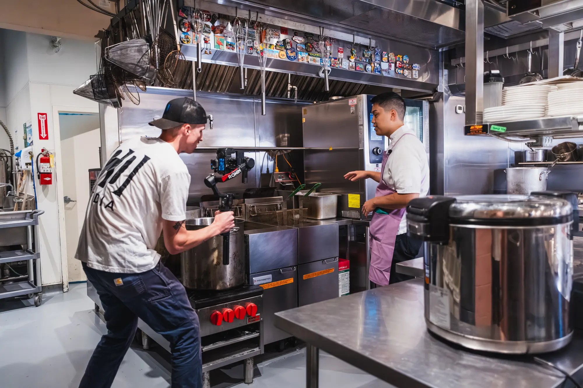 kitchen in service with staff working at Sunny's Chinese