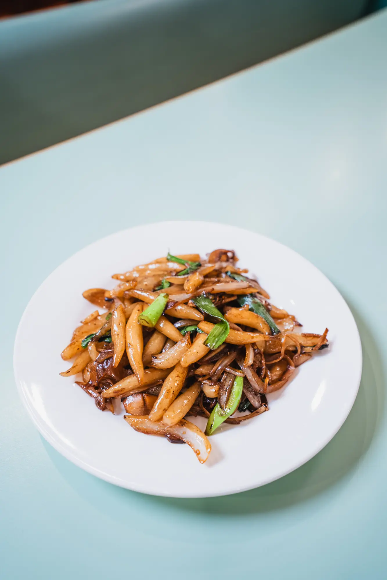 plated hand-cut noodle dish at Sunny's Chinese